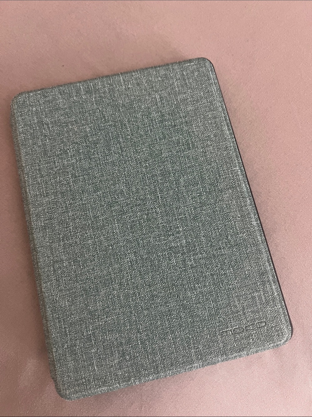 Kindle Paperwhite with teal cover